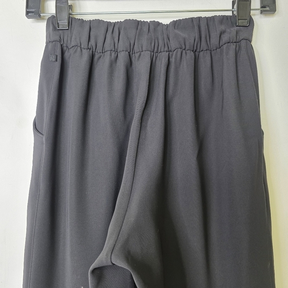 Lululemon Noir Wideleg pants with tie on the waist - Picture 8 of 11
